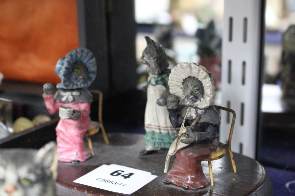 A group of assorted ornaments all relating to cats, comprising: boxed four piece desk set, a painted spelter three cat ornament, two fu